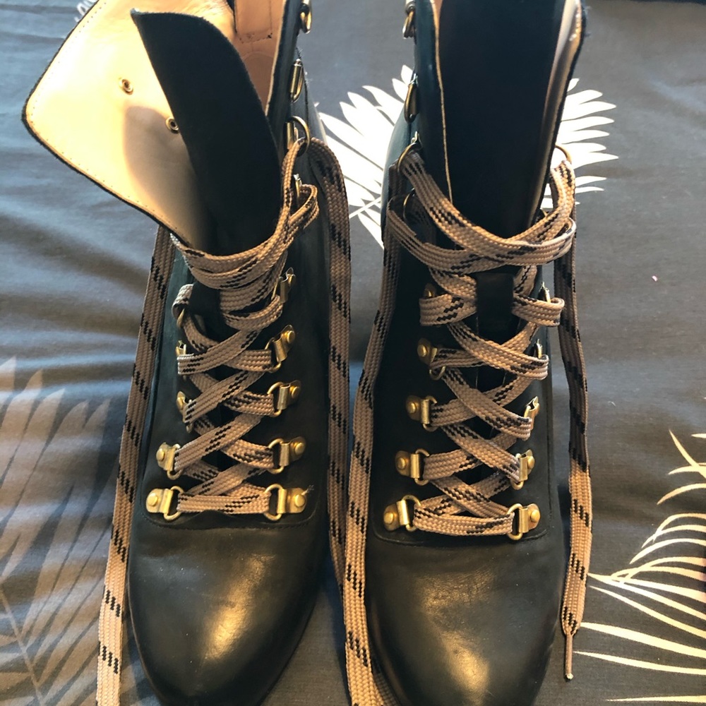 Black stylish tie up boots